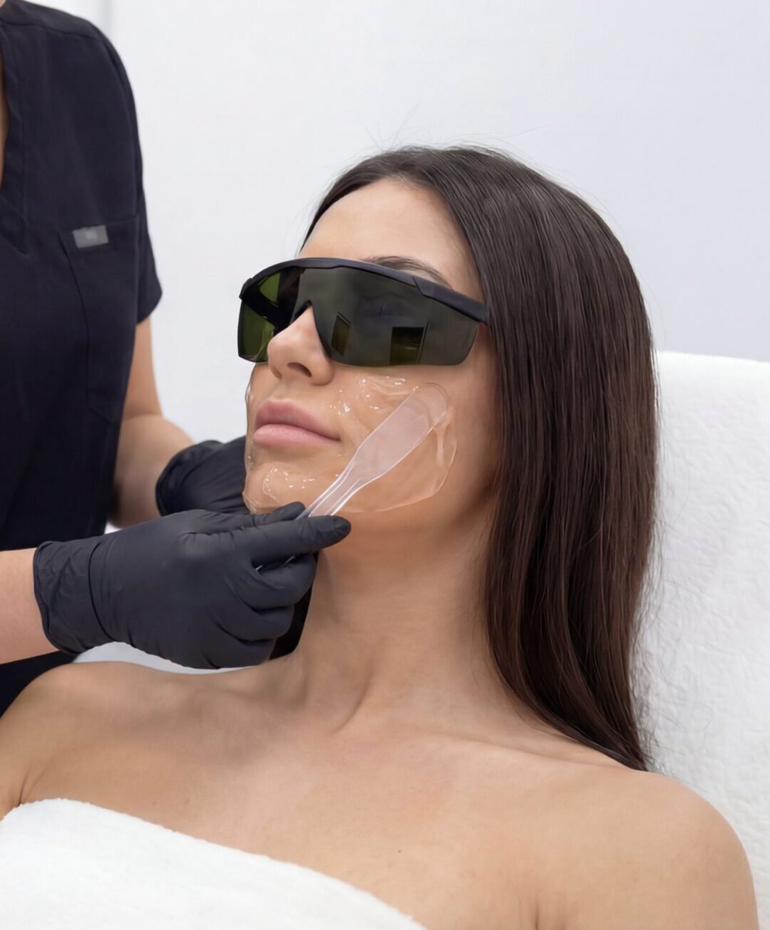 Woman with smooth skin after laser treatment